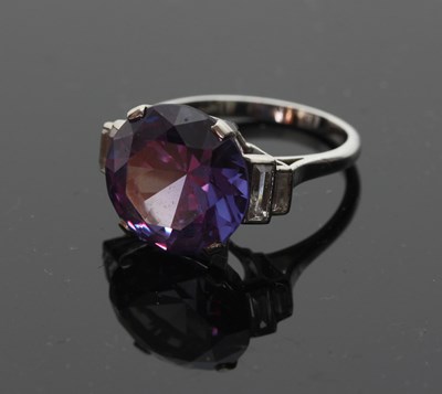 Lot 704 - A faux alexandrite dress ring, the large...