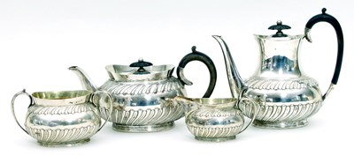 Lot 35 - An Edwardian four-piece silver tea set,...