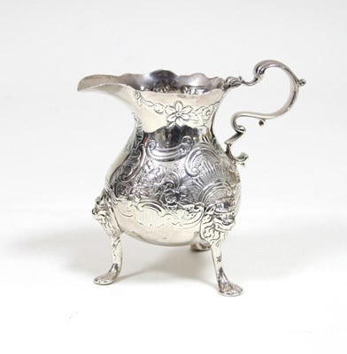 Lot 60 - An Irish silver jug, William Townsend, Dublin...