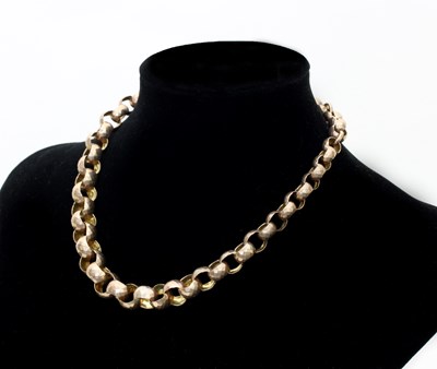 Lot 99 - A 9ct gold chain of graduated faceted links,...