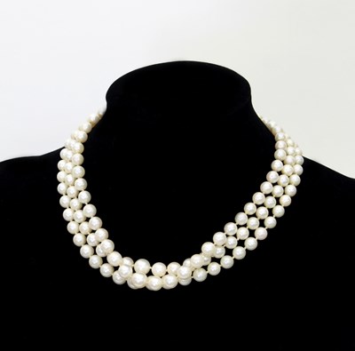 Lot 100 - A three-row cultured pearl necklace, the rows...