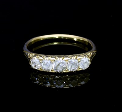 Lot 101 - A five-stone diamond ring, in a scroll setting...