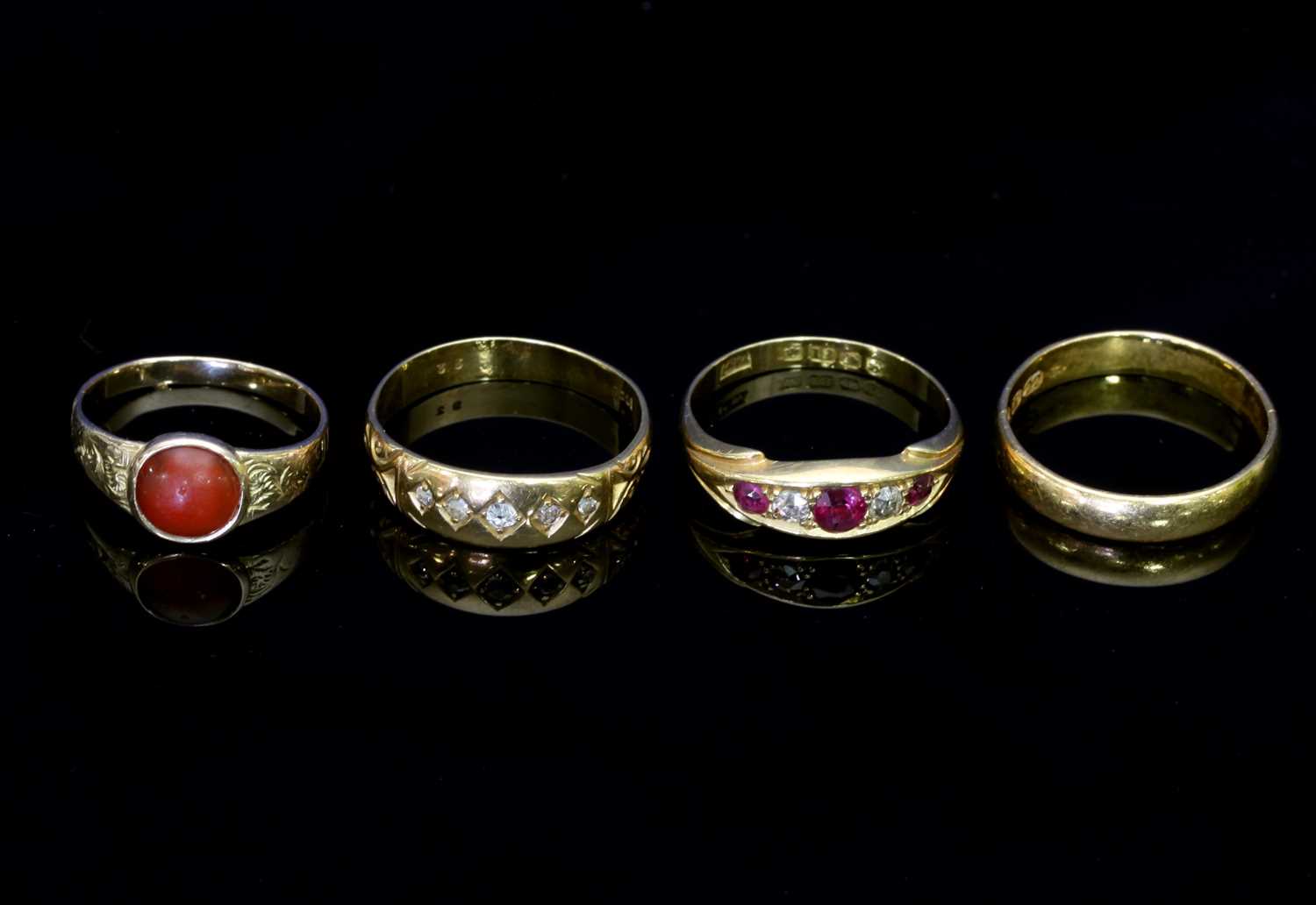 Lot 102 - A five-stone diamond ring, the gypsy set...