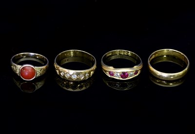 Lot 102 - A five-stone diamond ring, the gypsy set...