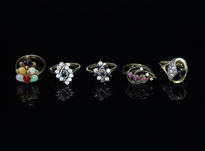 Lot 105 - A multi-gem set ring, set in 14k gold, the...