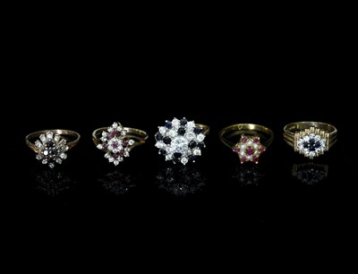 Lot 106 - Five gem set cluster rings, each on a 9ct gold...