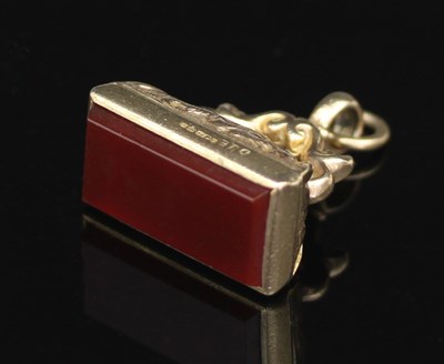 Lot 111 - A 9ct gold and hardstone fob seal, a Cartier...