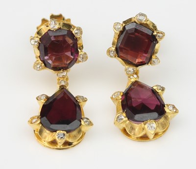 Lot 122 - A pair of garnet and diamond drop earrings,...