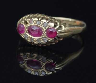 Lot 124 - An early 20th Century ruby and diamond ring,...