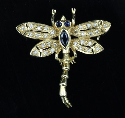 Lot 129 - An 18ct gold and gem set dragonfly brooch, the...