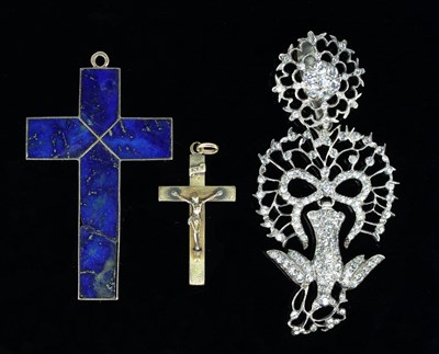 Lot 145 - A lapis lazuli cross pendant set in gold, 7cm...