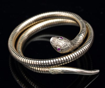 Lot 165 - A 9ct gold articulated snake bangle, with ruby...