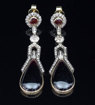 Lot 166 - A pair of garnet and diamond ear pendants, the...