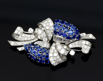 Lot 176 - A sapphire and diamond double clip brooch, of...