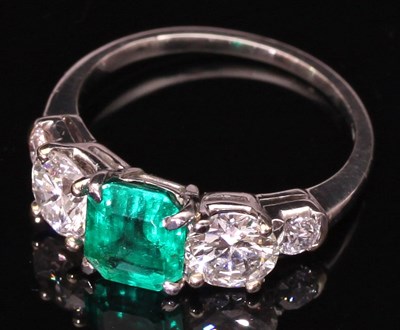 Lot 178 - An emerald and diamond five-stone ring, the...