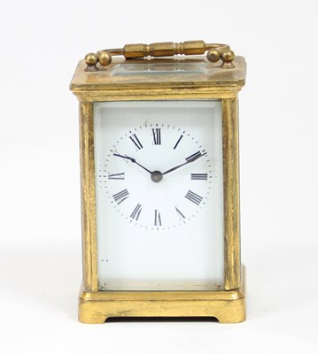 Lot 215 - A gilt brass cased carriage clock, the white...