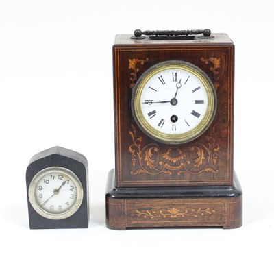 Lot 217 - A Victorian marquetry mantel clock, the enamel...