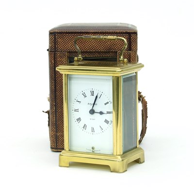 Lot 223 - A gilt brass eight-day carriage clock in a...