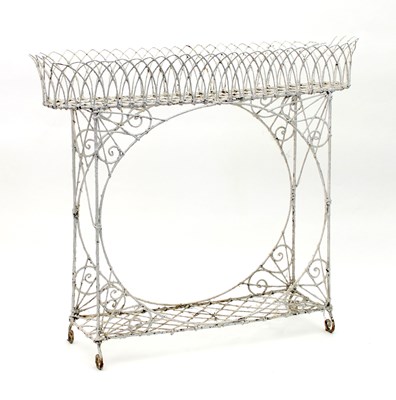 Lot 240 - A painted wire jardiniere stand, with oval...