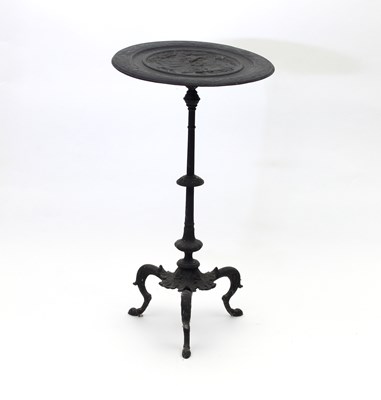 Lot 241 - A circular cast iron garden table, the top...