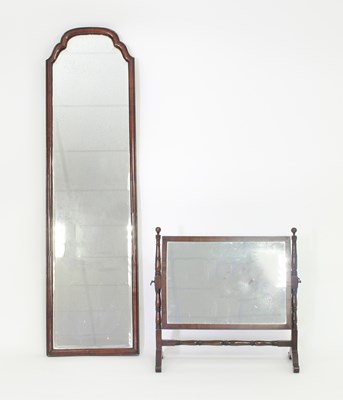 Lot 250 - A 19th Century swing frame mirror on turned...