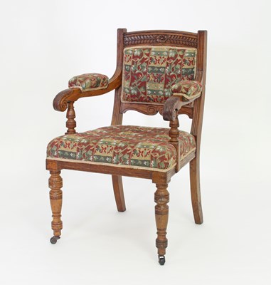 Lot 256 - A late 19th Century walnut framed armchair