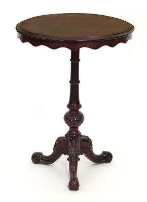 Lot 269 - A late 19th Century tripod table with shaped...