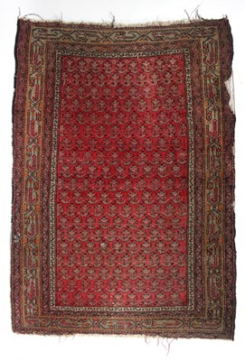 Lot 270 - A Turkish rug, the medallion within a red...