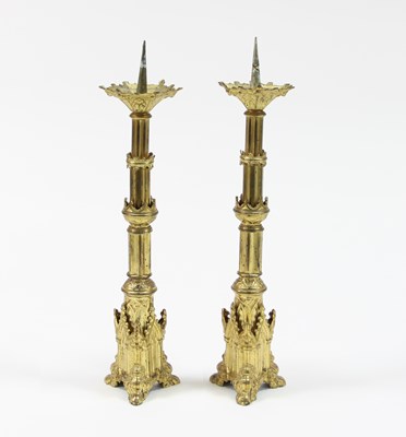 Lot 277 - A pair of Pugin style gilt metal altar...