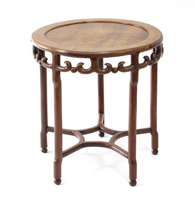 Lot 309 - An Oriental circular hardwood table with...