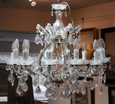 Lot 365 - A twelve-branch twelve-light chandelier, the...