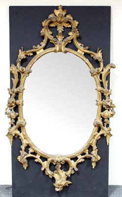 Lot 369 - A George III giltwood wall mirror, the oval...