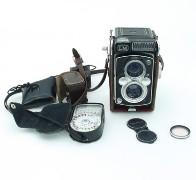 Lot 397 - A Yashica 2?? square two lens camera (damaged)