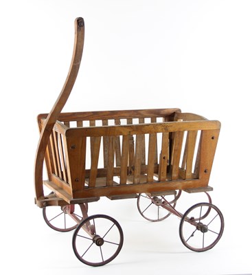 Lot 401 - An early 20th Century pine handcart with pull...