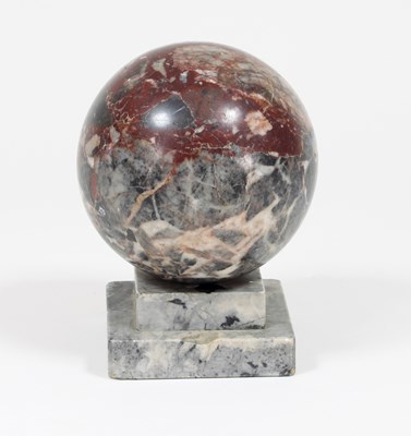 Lot 409 - A marble table ornament of globe form on a...