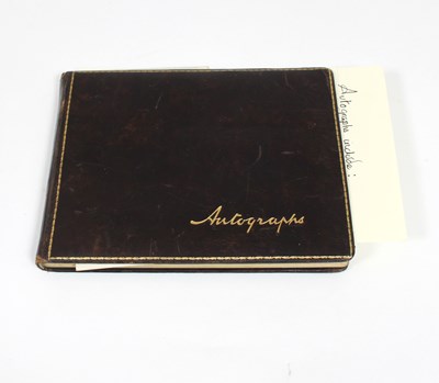 Lot 618 - An autograph book including autographs of...