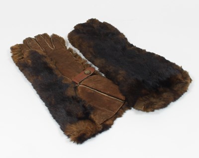 Lot 631 - A pair of fur gauntlets by Dents of Worcester