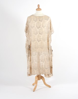 Lot 642 - A 1920s cream chiffon dress of tabard style...