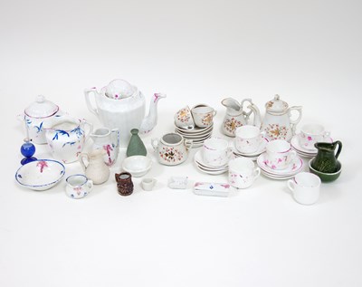 Lot 654 - A quantity of dolls house pottery and...