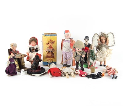 Lot 660 - A group of miniature dolls, toys and related,...