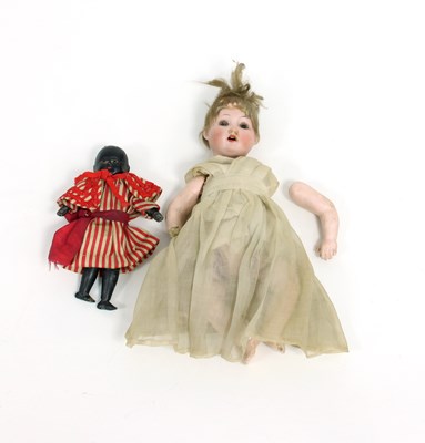 Lot 666 - A Simon and Halbig bisque head doll, 7/10 and...