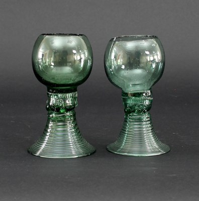 Lot 672 - Two 18th Century green glass roemers with...