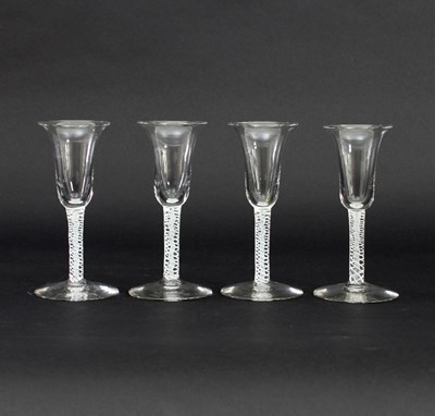 Lot 674 - A set of four 18th Century wine glasses, each...