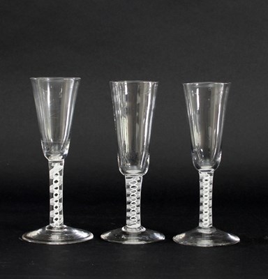 Lot 676 - Three similar 18th Century ale glasses, each...