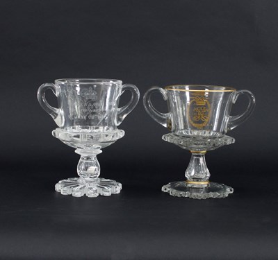 Lot 678 - Two commemorative glass goblets, early 20th...