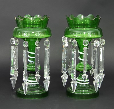 Lot 680 - A pair of green glass lustres, each applied...