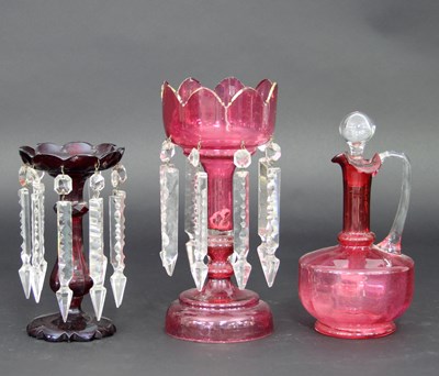 Lot 681 - Two glass lustres, one in pink with a gilded...