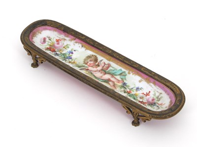 Lot 705 - A French porcelain gilt metal mounted pen tray...