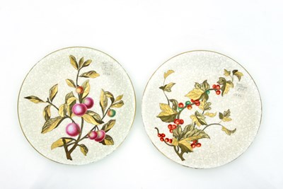 Lot 709 - A pair of Royal Worcester plates painted fruit...