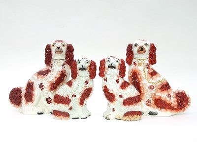 Lot 710 - A pair of Staffordshire liver and white dogs,...